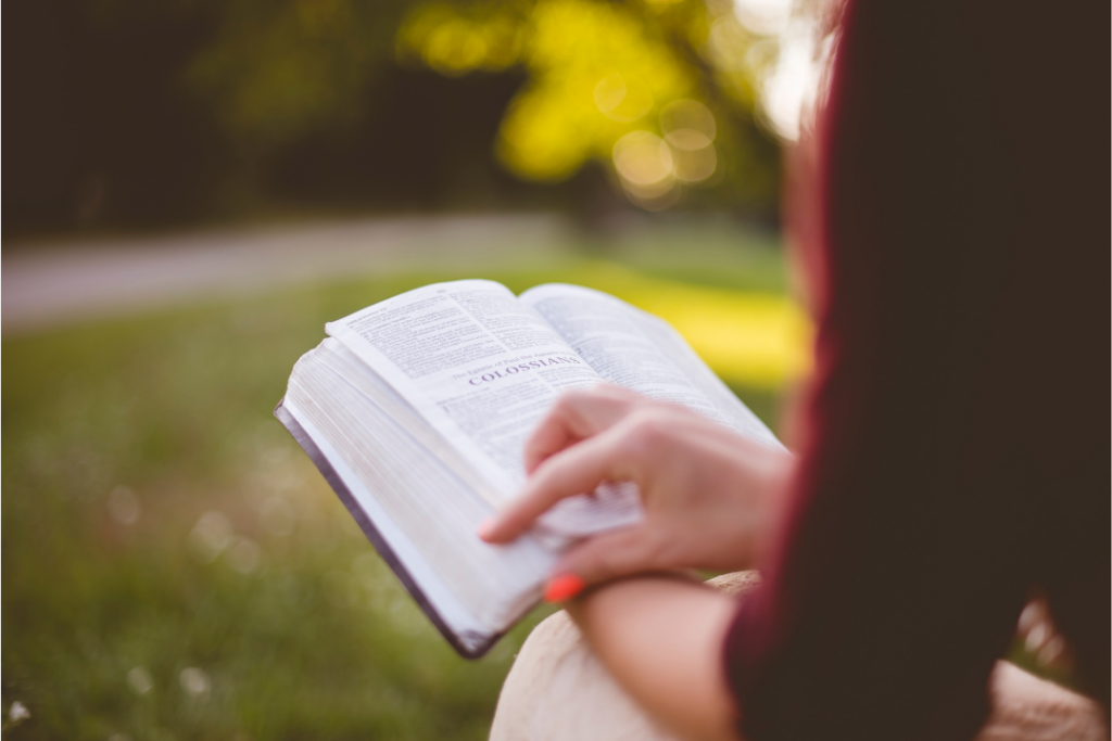 Woman reading a bible